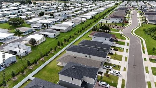 Slika na platnu Florida trailer park adjacent to new single-family housing in Florida