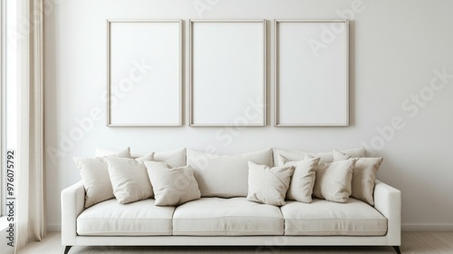 a mockup for wall art, clean white interior with beige tones, a couch against the wall, 3 portrait size frames on the wall, 