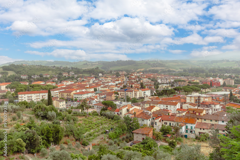 Panoramic view of Certaldo in Tuscany, showcasing its charming rooftops and surrounding countryside during a clear day Panoramic view of Certaldo in Tuscany, showcasing its charming rooftops and surrounding countryside during a clear day