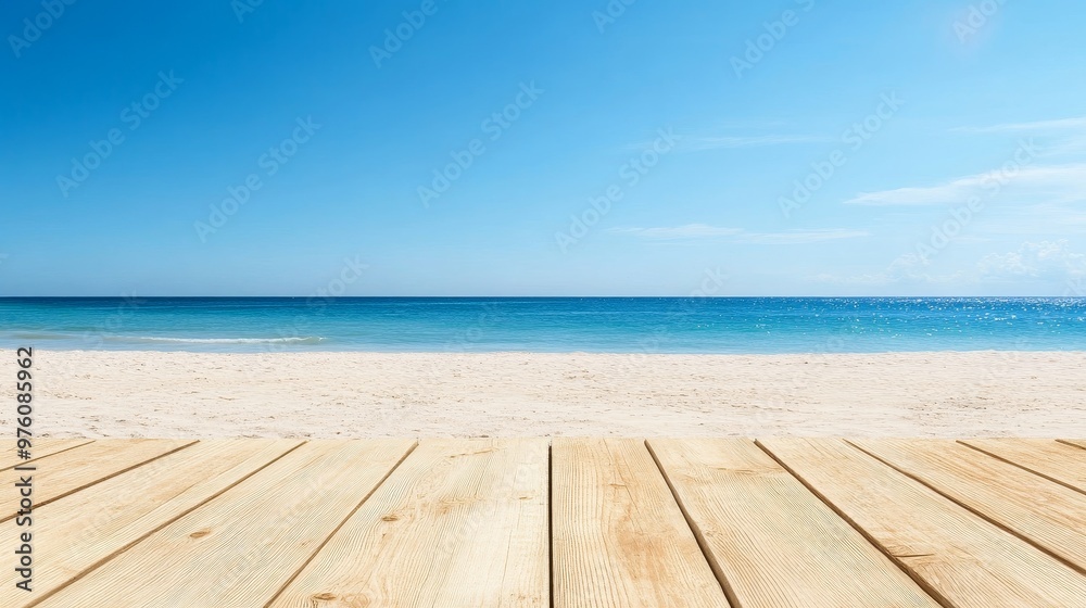 Fototapeta premium A wooden plank on a sunny beach with clear blue sky and turquoise ocean water, ideal for showcasing products or representing summer vacation, relaxation, and tropical getaway.