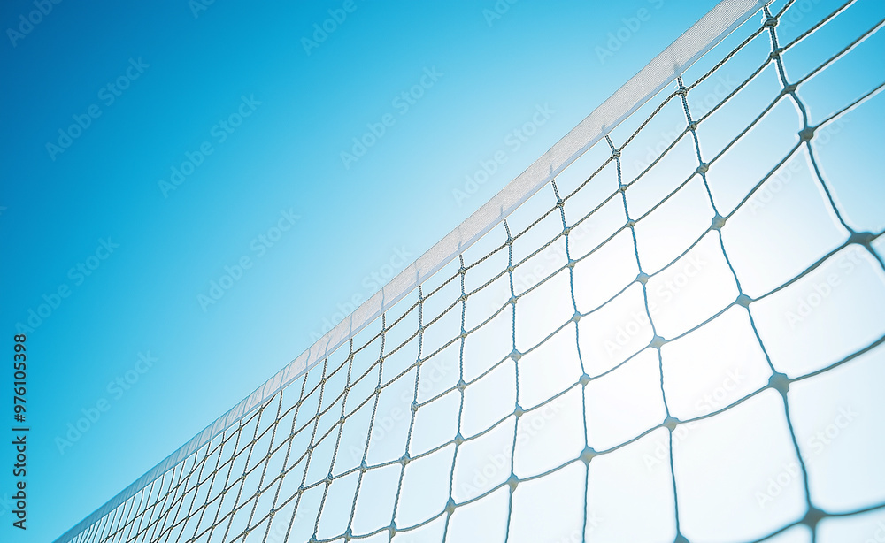 A volleyball net stretches across a bright blue sky, symbolizing outdoor sports and summer activities. A volleyball net stretches across a bright blue sky, symbolizing outdoor sports and summer activities.