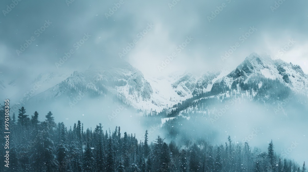 A snowstorm sweeping over a mountain range with heavy snowfall A snowstorm sweeping over a mountain range with heavy snowfall