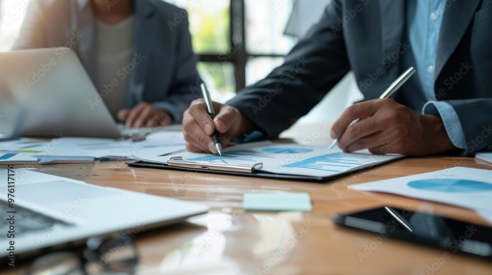 An office environment where team members are working on an online document together