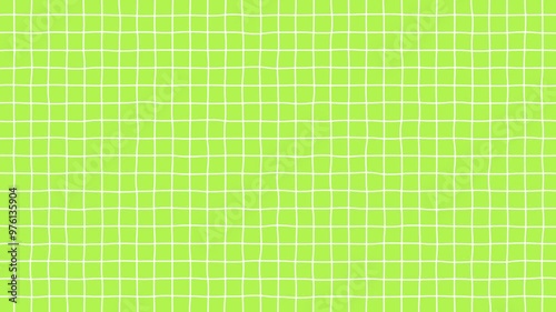 Loop video of simple background of graph paper with hand-drawn white lines moving jaggedly (green)