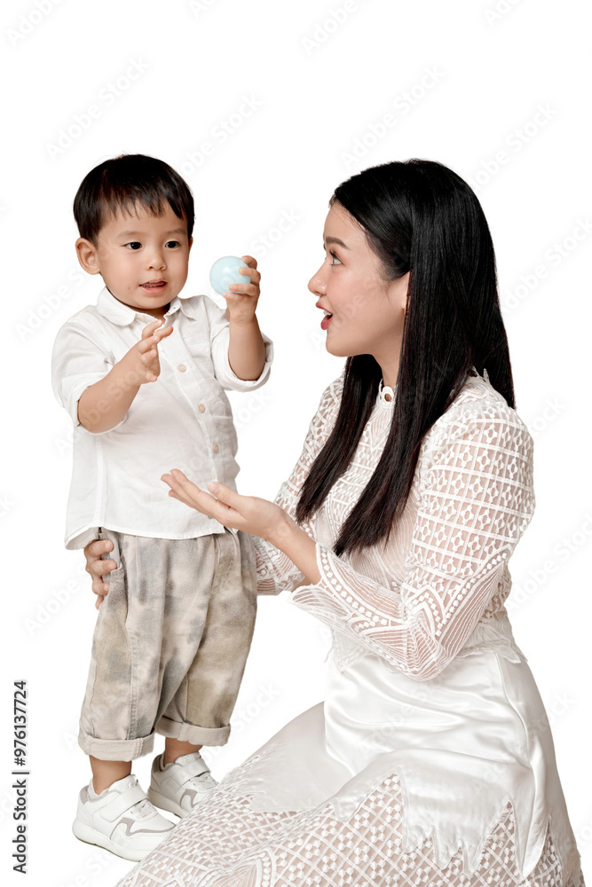 Asian Mother and child bonding moment with a ball, isolated on white background. The child is wearing casual clothes while the mother wears a white dress. transparent PNG white background. Asian Mother and child bonding moment with a ball, isolated on white background. The child is wearing casual clothes while the mother wears a white dress. transparent PNG white background.