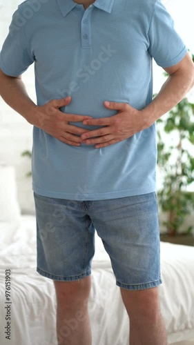 Stomach ulcer, man with abdominal pain suffering at home, symptoms of gastritis, diseases of the digestive system, health problems concept