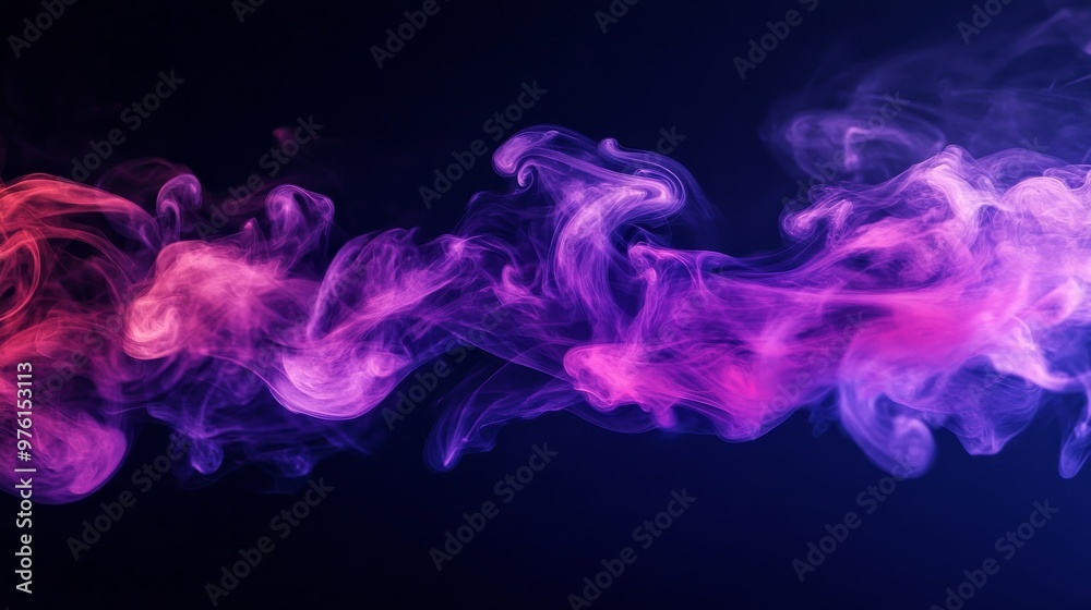Colorful smoke flowing on dark background Colorful smoke flowing on dark background