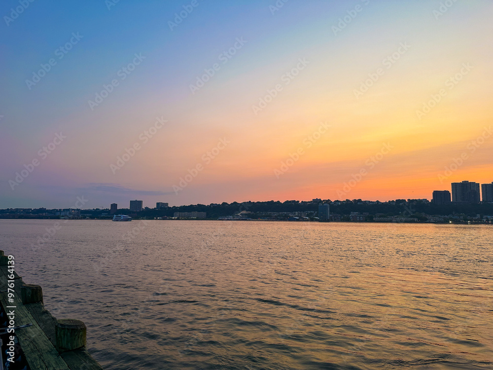 Naklejka premium Hudson River West Harlem Piers Manhattan New York City. View of New Jersey. Sunset