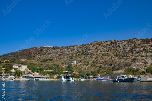 Zakynthos August 2024, amazing multicolored and surprising landscapes and a floating ship on the sea