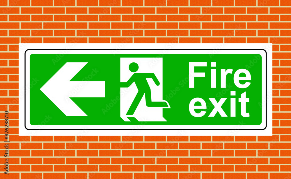 Fire exit left sign on a wall Fire exit left sign on a wall