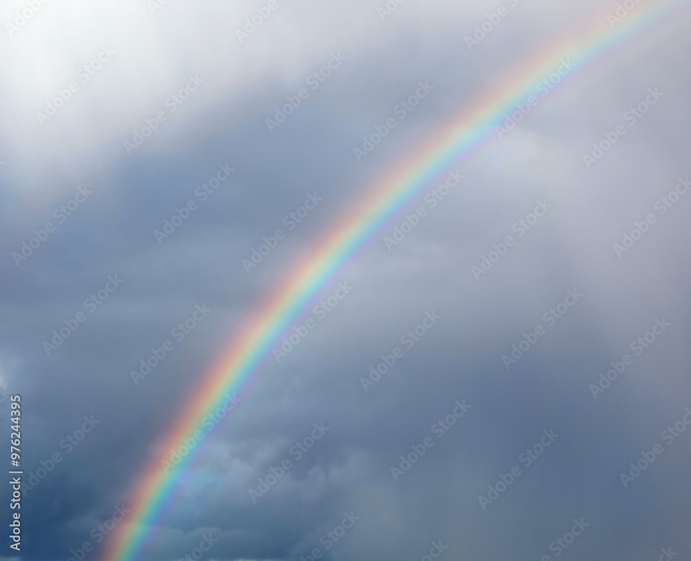 rainbow arch in the sky after the storm and it is a sign of good luck and good fortune rainbow arch in the sky after the storm and it is a sign of good luck and good fortune