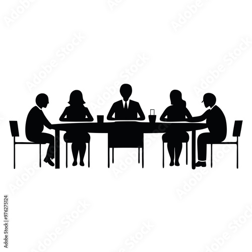 a group of six people sitting around a long table. The table is rectangular in shape and appears to be made of wood