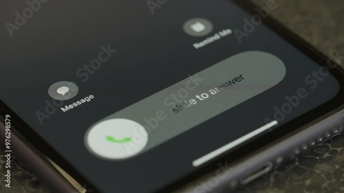 Incoming call on mobile phone close up macro video. Take or decline the phone call