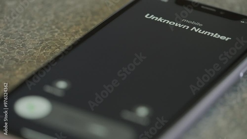 Incoming call from unknown number on  smartphone macro video.