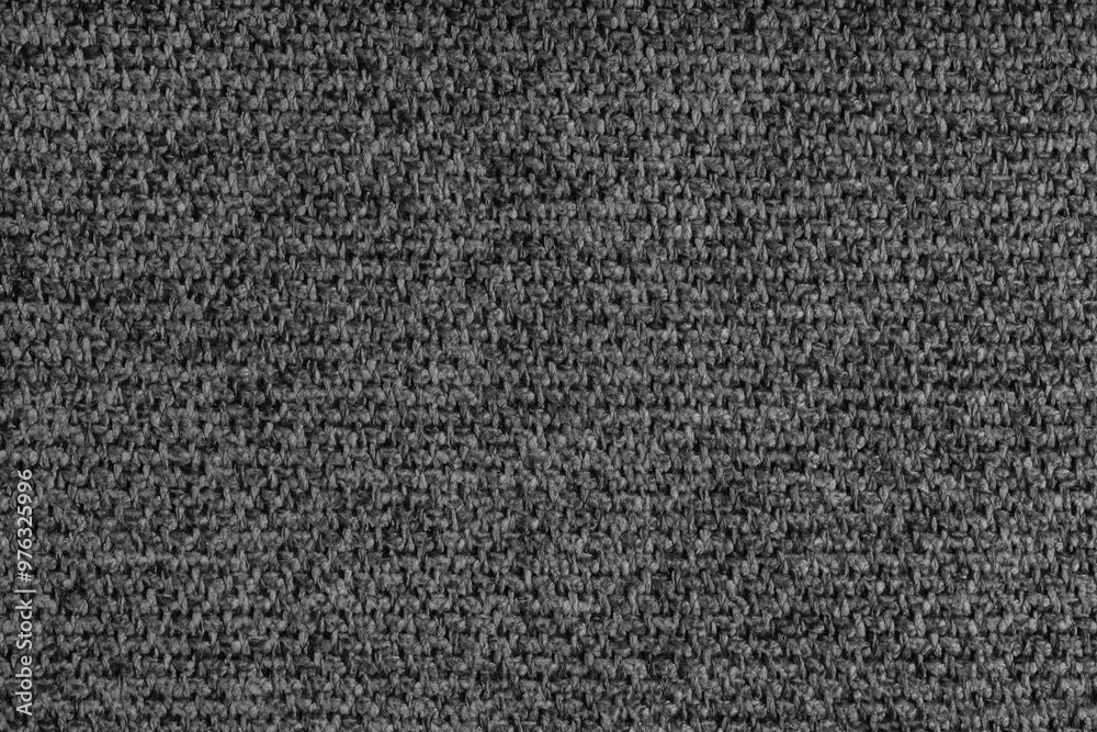 Fototapeta premium Coarse weave texture upholstery black jacquard fabric, textile background, cloth structure