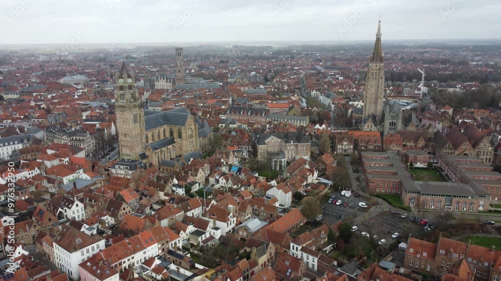 Brugge from an aerial perspective, highlighting its historical charm, architectural beauty, and scenic waterways Brugge from an aerial perspective, highlighting its historical charm, architectural beauty, and scenic waterways