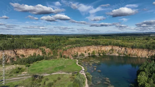 Wallpaper Mural Aerial drone photo of Quarry turquiose lake colour, open pit mining in Park Grodek, Jaworzno. Poland. Turquiose Water and Wooden Bridge on lake. Polish Maldives Park Grodek in Jaworzno from drone. Torontodigital.ca