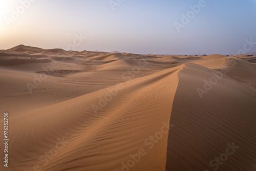 Erg Chebbi dunes at sunrise with harsh light