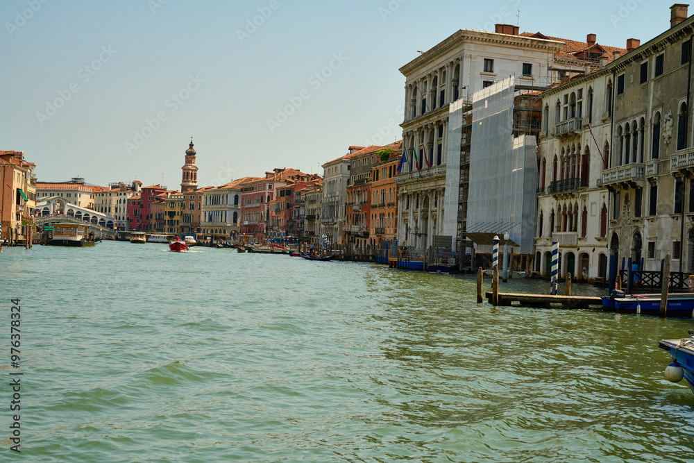 Fototapeta premium Venice and its buildings,canals,gondolas,and sculptures