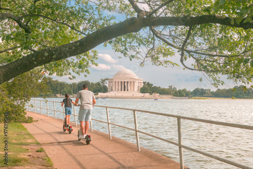 Photos Two children on scooters on the path next to Washington DC's Tidal Basin with a