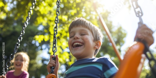 Two children enjoy a sunny afternoon laughing and swinging in a vibrant park, capturing the carefree essence of childhood and outdoor play under a bright sky. photo