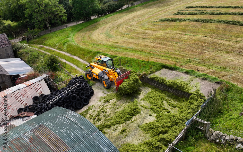 Aerial View of a JCB telescopic handler Buckraking Silage and John ...