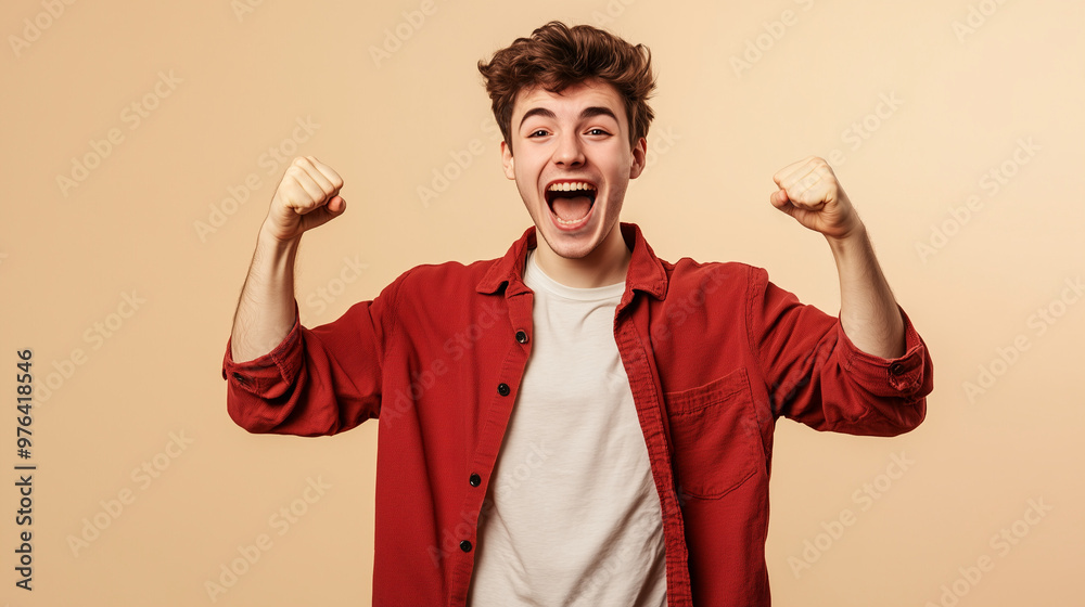 Excited Young Man Shouting in Red Shirt Excited Young Man Shouting in Red Shirt