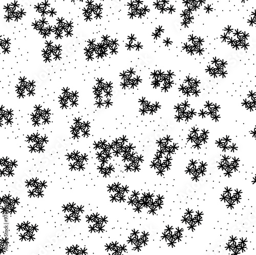 A large accumulation of heavy, clumped snowflakes and dots.