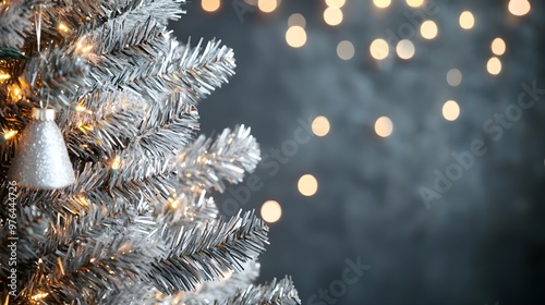 Silver Christmas Tree with Lights and Bokeh Background