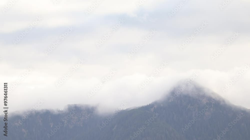 Mountain Peak Behind Misty Clouds Mountain Peak Behind Misty Clouds