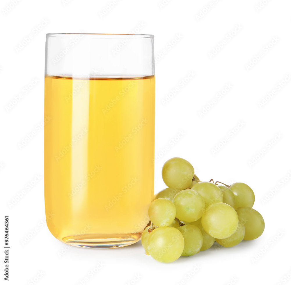 Tasty juice in glass and grapes isolated on white Tasty juice in glass and grapes isolated on white