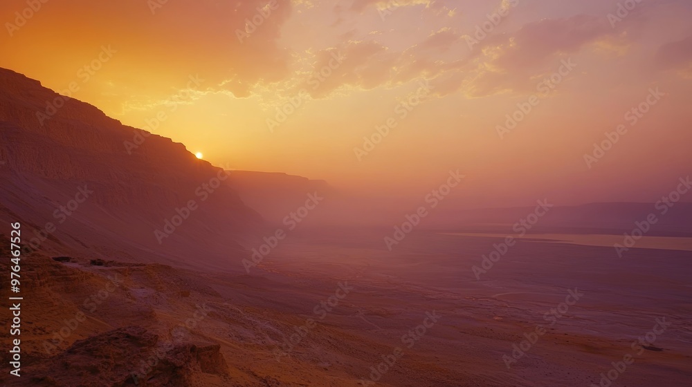 The mountains of Sodom located on the south-west side of the Dead Sea. Sunset on a foggy mountain range Sodom. Evening red sunset sky over mountain Sodom Gomorrah in Dead sea from Negev desert Israel The mountains of Sodom located on the south-west side of the Dead Sea. Sunset on a foggy mountain range Sodom. Evening red sunset sky over mountain Sodom Gomorrah in Dead sea from Negev desert Israel