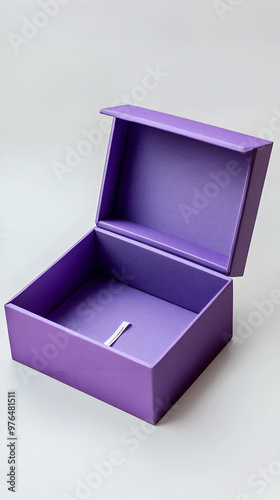 An elegant purple box with a lid, perfect for storing jewelry, trinkets, or gifts. A stylish addition to any decor. photo