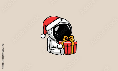 Astronaut in Santa hat holding a Christmas gift.