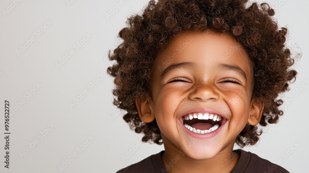 Happy Little Boy with Curly Hair Smiling and Laughing Happy Little Boy with Curly Hair Smiling and Laughing