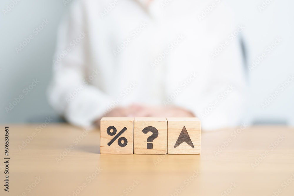 Naklejka premium wood block of Question mark with percentage change to UP and Down arrow. Interest rate, GDP, stocks market, financial, deflation and Inflation, ranking, mortgage, debt, Loan and Economic Recession