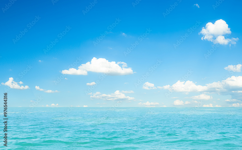 Naklejka premium Summer background sea blue with cloud sky, coast island scene mockup water nature travel vacation holidays tropical, mockup ocean ecosystem energy change environment, backdrop product cosmetic.