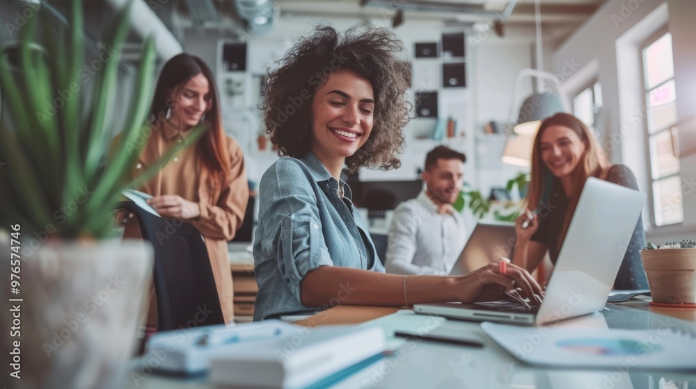 A group of colleagues working together in a collaborative work environment. A group of colleagues working together in a collaborative work environment.