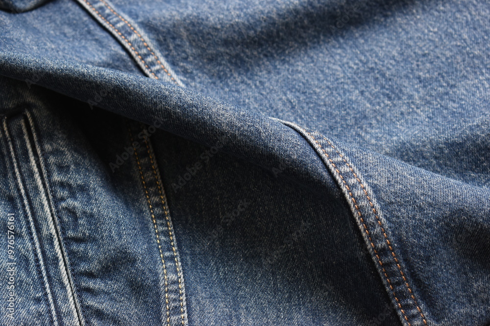 Fototapeta premium seam of blue denim texture background, jean fashion style