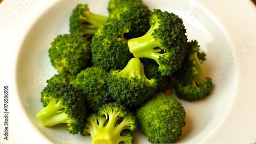 A plate of roasted broccoli with garlic and_