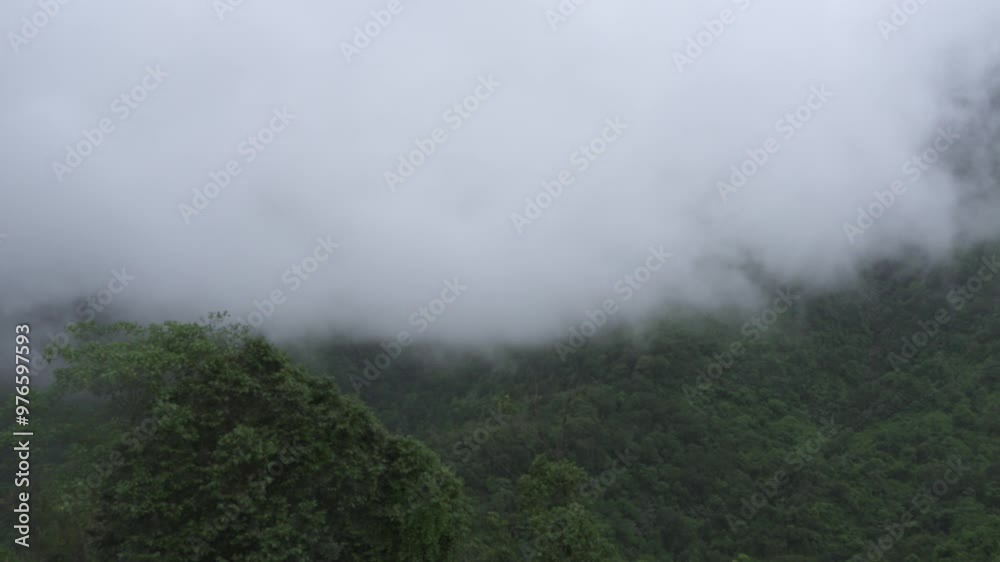The mountains are covered with clouds. The mountains are covered with clouds.