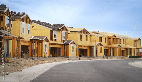 Row of single family homes under construction