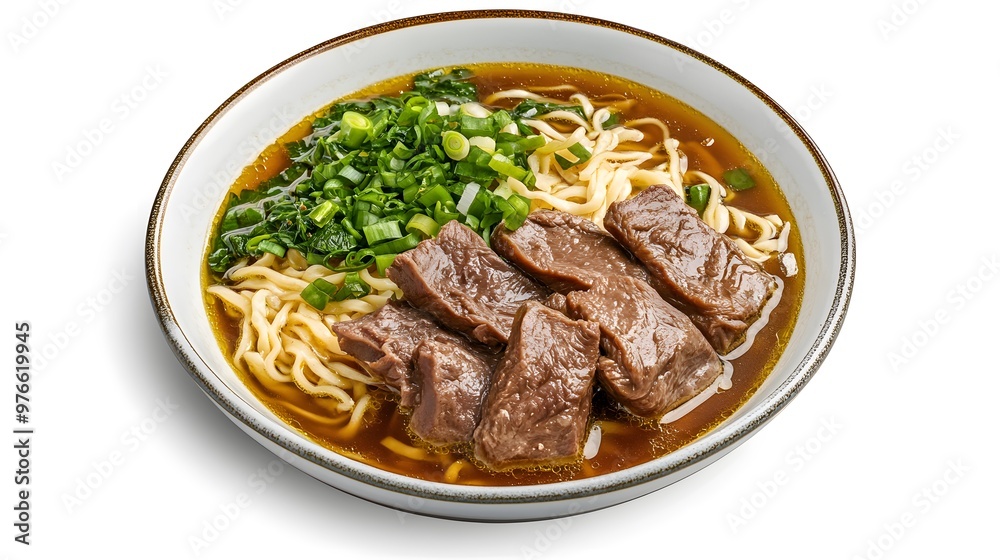 Delicious beef noodle soup with scallions and fresh greens in a white bowl Delicious beef noodle soup with scallions and fresh greens in a white bowl