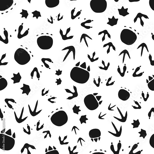 Dinosaur footprints seamless pattern background. Vector black and white playful tile for kids. Monochrome prehistoric ornament, wallpaper or fabric print with funny dino animals paw tail imprints