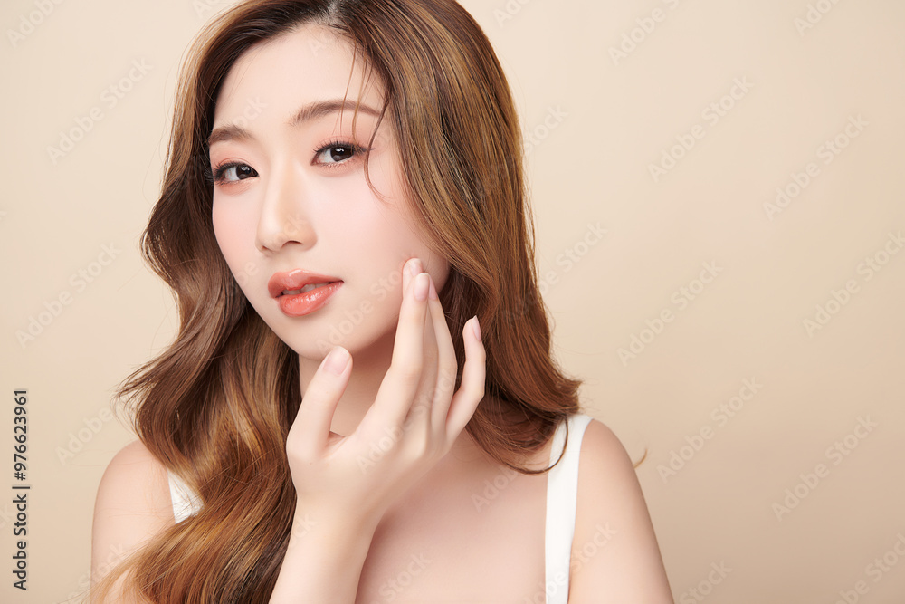 Beautiful young asian woman with clean fresh skin on beige background, Face care, Facial treatment, Cosmetology, beauty and spa, Asian women portrait. Beautiful young asian woman with clean fresh skin on beige background, Face care, Facial treatment, Cosmetology, beauty and spa, Asian women portrait.