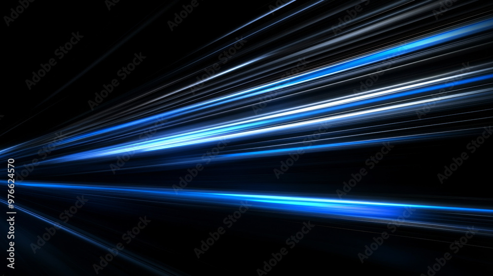 Blue light streaks racing across a black backdrop, creating a sense of speed and motion. Blue light streaks racing across a black backdrop, creating a sense of speed and motion.