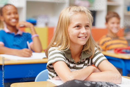 Smile, education and kids in classroom for learning, growth and child development at elementary school. Happy, face and students at desk for lesson, study and future opportunity for scholarship.