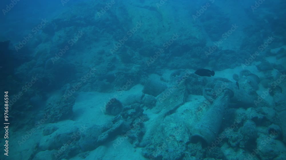 Sunken artifacts filmed from the porthole of a tourist submarine underwater in the Red Sea, Egypt Sunken artifacts filmed from the porthole of a tourist submarine underwater in the Red Sea, Egypt