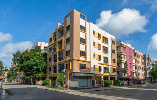 Residential multi-storey apartment buildings with city road at Rajarhat area of Kolkata, India. photo