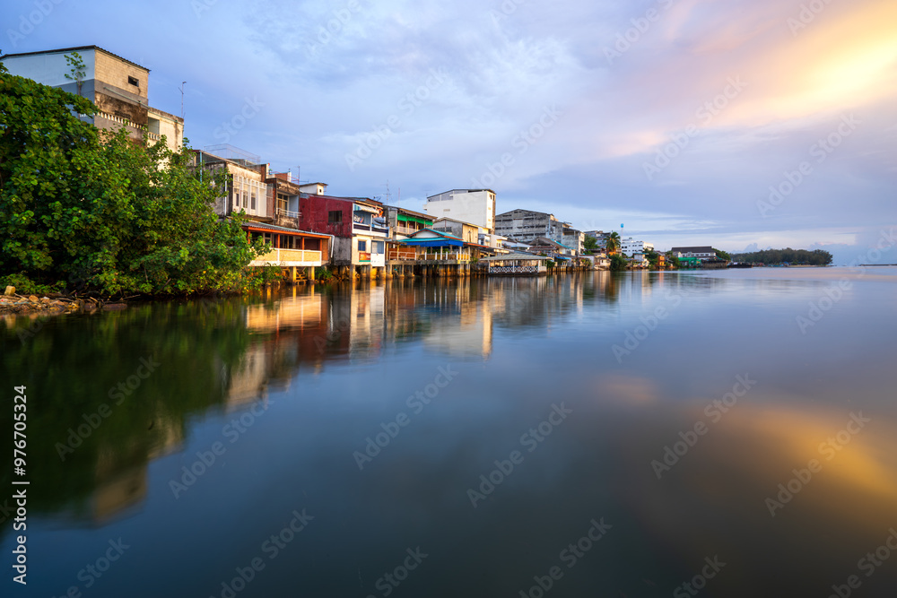 People's houses along the Bang Nara River Narathiwat Province, Thailand. People's houses along the Bang Nara River Narathiwat Province, Thailand.